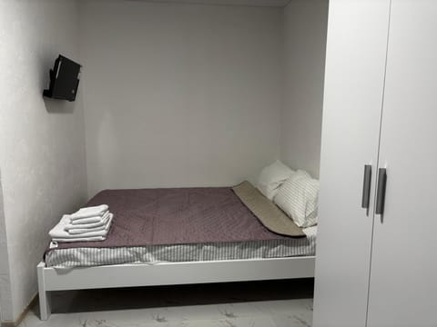 Bed, wardrobe