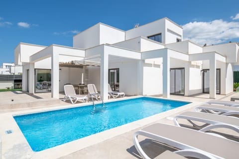 Property building, Living room, Swimming pool