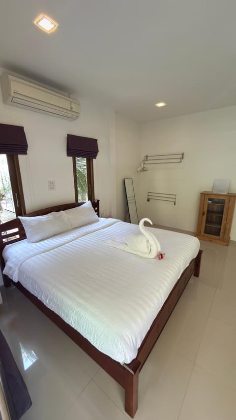 Bed, Bedroom, towels, wardrobe, air conditioner