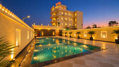 Property building, Night, Pool view, Swimming pool