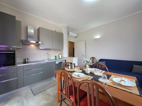 Kitchen or kitchenette, Living room, Dining area, oven, stove