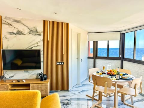 Natural landscape, TV and multimedia, Living room, Seating area, Dining area, Sea view