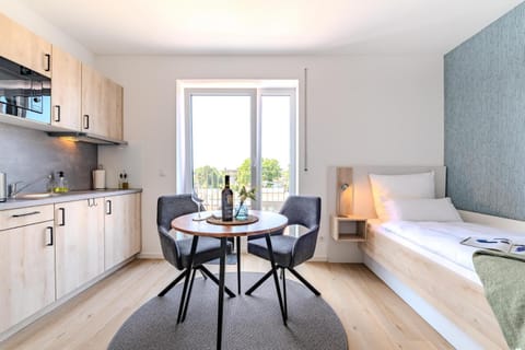 Bed, Kitchen or kitchenette, Living room, Photo of the whole room, Seating area