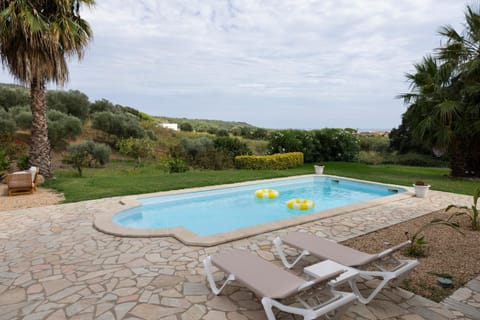 Property building, Living room, Swimming pool