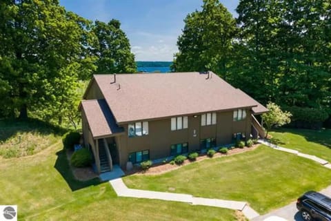 Scenic AGaMing Escape Torch Lake Views and Golf House in Torch Lake