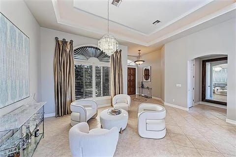 Waterfront Retreat! Breathtaking Water Views - Sparkling Pool & Dock - Walk to the Beach! House in Vanderbilt Beach