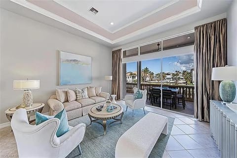 Waterfront Retreat! Breathtaking Water Views - Sparkling Pool & Dock - Walk to the Beach! House in Vanderbilt Beach