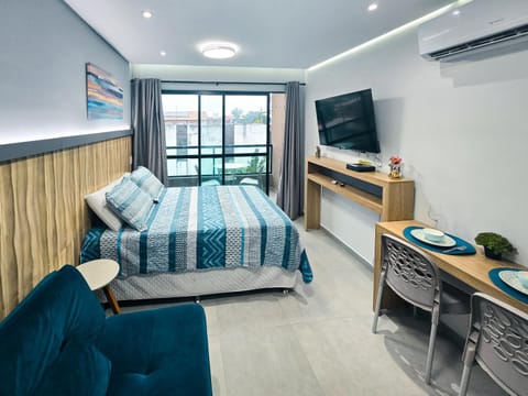 Communal lounge/ TV room, Bed, TV and multimedia, Living room, Photo of the whole room, Seating area, Bedroom, air conditioner