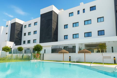 Property building, Day, Pool view, Swimming pool, Swimming pool, sunbed