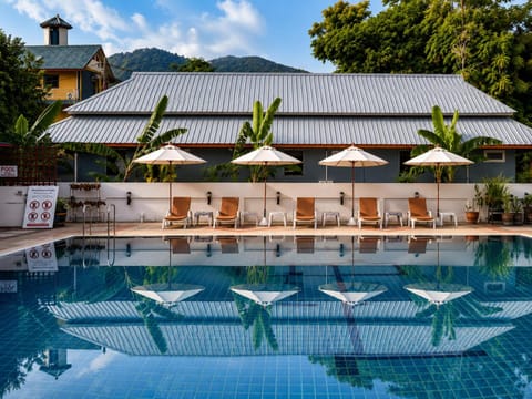 Property building, Patio, Swimming pool, sunbed