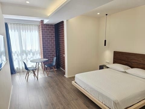 Bed, Living room, Photo of the whole room, Seating area, Bedroom