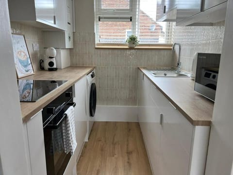 Kitchen or kitchenette, oven, stove, toaster