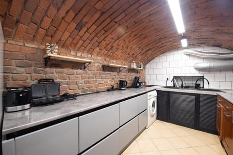 Kitchen or kitchenette, stove, toaster