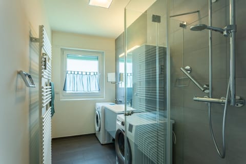 Shower, Bathroom, towels, washing machine, dryer