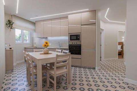 Kitchen or kitchenette, dishwasher, oven, stove, toaster