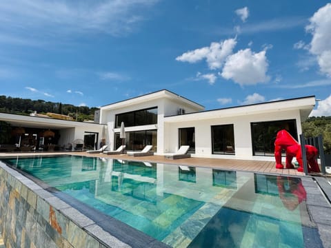 Property building, Living room, Swimming pool