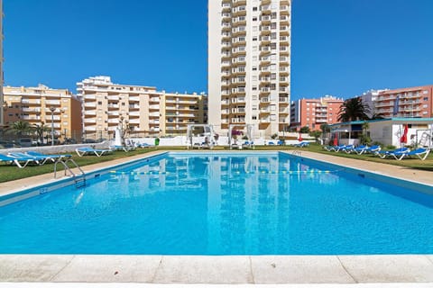Property building, Living room, Swimming pool