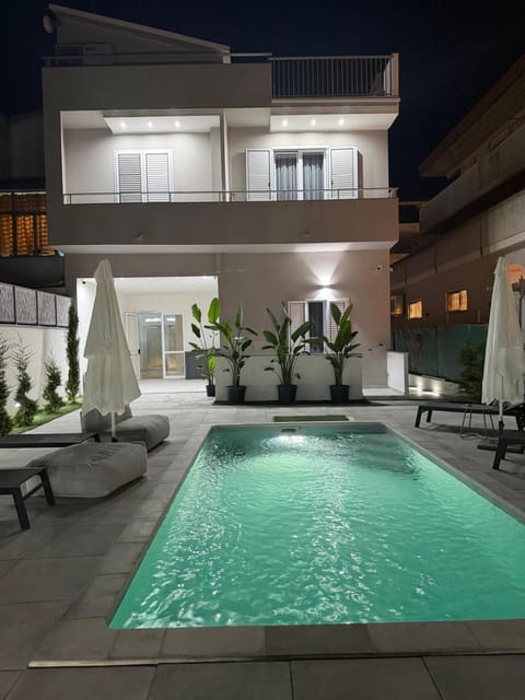 Night, Pool view, Swimming pool, sunbed