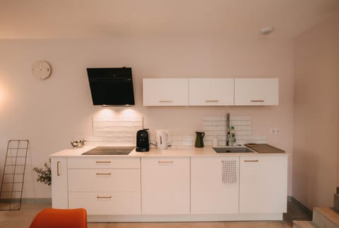 Kitchen or kitchenette, stove