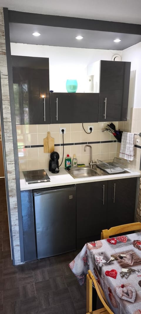 Kitchen or kitchenette, stove