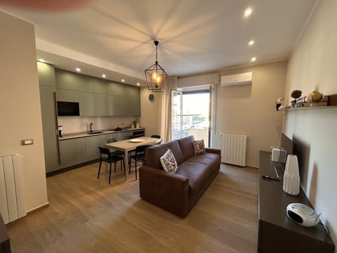 Kitchen or kitchenette, Living room, Seating area, Dining area, stove