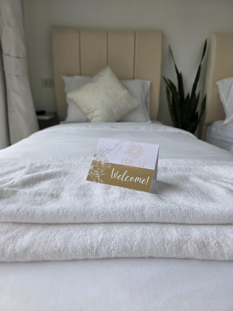 Bed, Property logo or sign, Bedroom