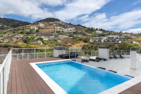 Day, Natural landscape, Mountain view, Swimming pool, sunbed