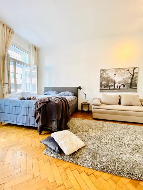 Property building, Bed, Seating area, Bedroom