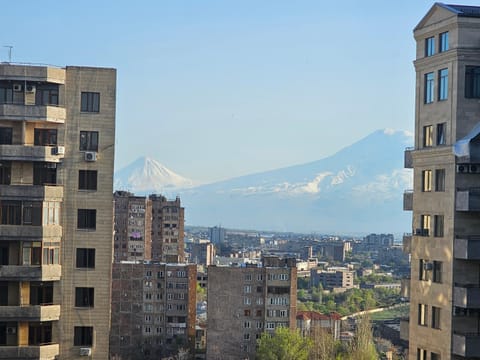 Property building, Nearby landmark, Day, Mountain view