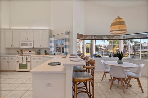 Luxury 4-Bedroom Canal Home with Pool House in Palm Coast