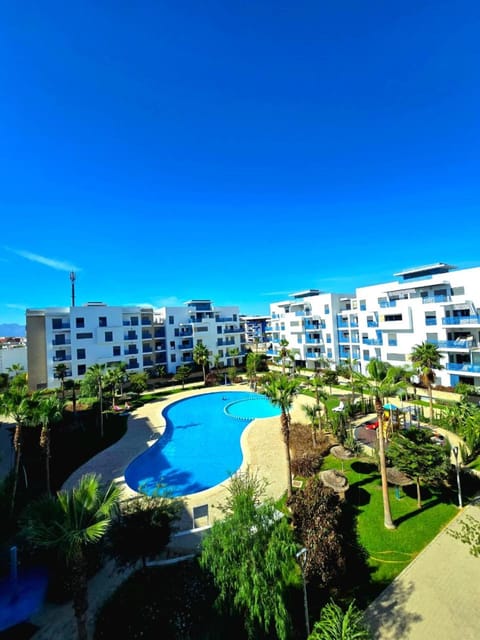 Property building, Day, Pool view, Swimming pool, sunbed