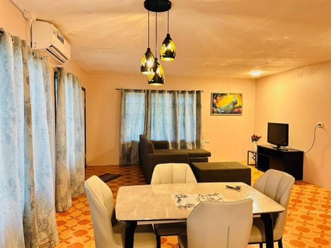 TV and multimedia, Living room, Photo of the whole room, Seating area, Dining area, air conditioner
