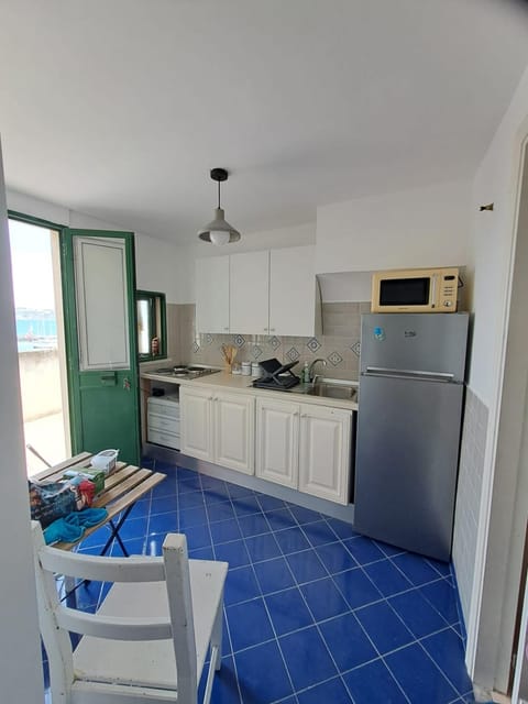 Kitchen or kitchenette, oven, stove