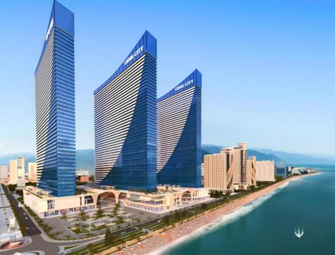 Property building, Nearby landmark, Day, Natural landscape, Beach, City view, Sea view