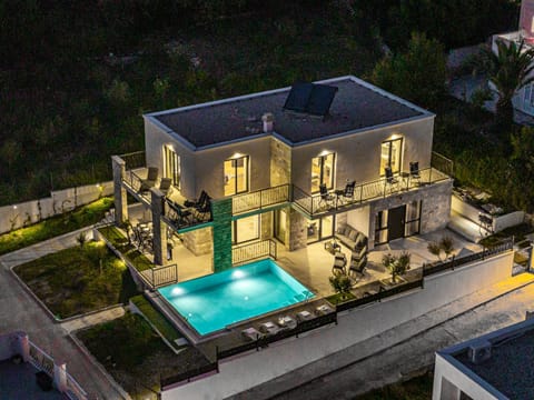 Property building, Patio, Night, Bird's eye view, Pool view, Swimming pool, sunbed