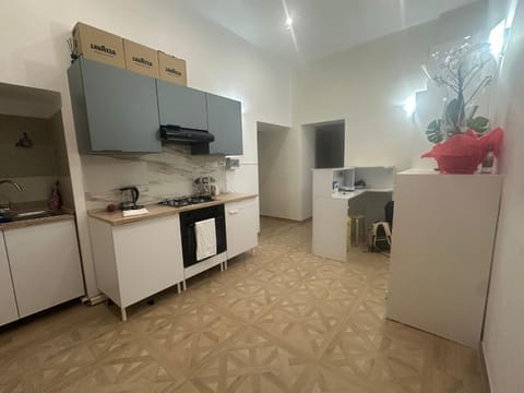 Kitchen or kitchenette, oven, stove
