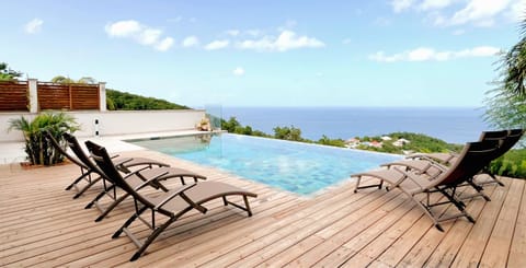 Patio, View (from property/room), Pool view, Sea view, Swimming pool, sunbed
