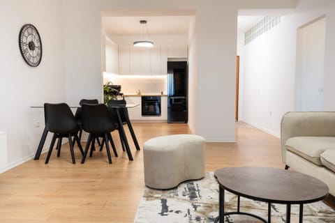 Kitchen or kitchenette, Living room, Seating area, Dining area