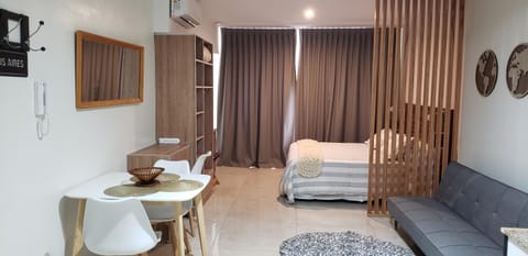 Bed, TV and multimedia, Living room, Photo of the whole room, Seating area, Bedroom, air conditioner