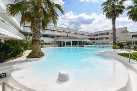 Property building, Day, Natural landscape, Pool view, Swimming pool, sunbed