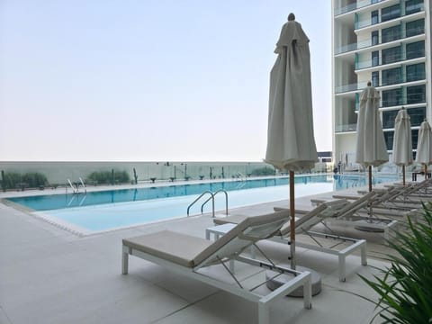 Swimming pool, sunbed