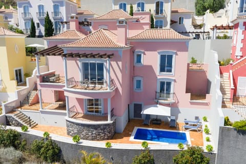 Property building, Day, Pool view, Swimming pool, sunbed