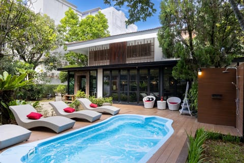 Property building, Patio, Day, Natural landscape, Garden, Pool view, Swimming pool, Swimming pool, sunbed
