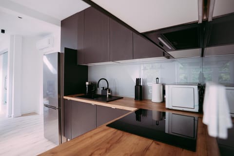 Kitchen or kitchenette, oven, stove