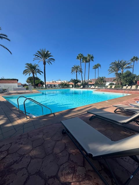 Property building, Living room, Swimming pool