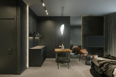 Bed, TV and multimedia, Living room, Seating area, Bedroom