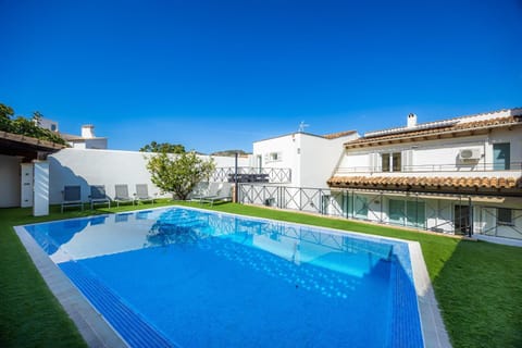 Property building, Living room, Swimming pool