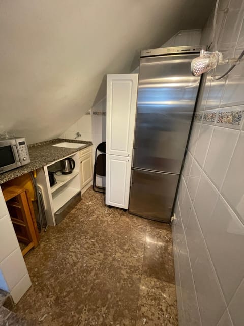 Kitchen or kitchenette, microwave