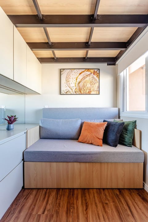 Bed, Living room, Seating area, Bedroom