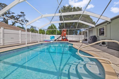 Family Retreat with Heated Pool, Playground, Ping Pong Table House in Florida